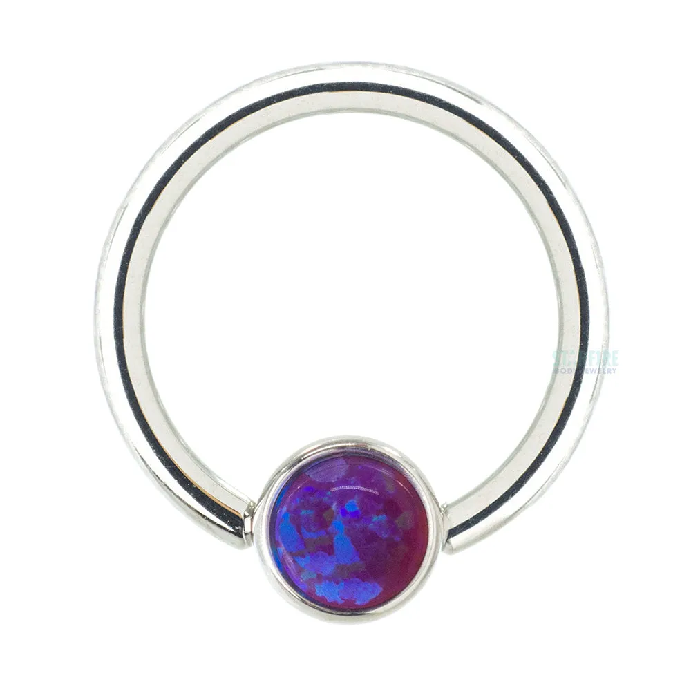 Captive Bead Ring (CBR) in Gold with Bezel-set Fuchsia Opal Captive Bead