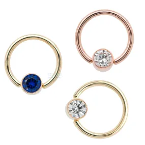 Captive Bead Ring (CBR) in Gold with Bezel-set Pink CZ Captive Bead